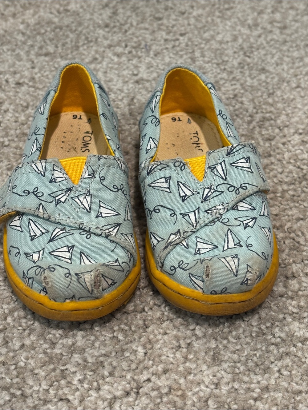 TOMS Kids Light Blue Paper Plane Canvas Slip-Ons with Yellow Trim